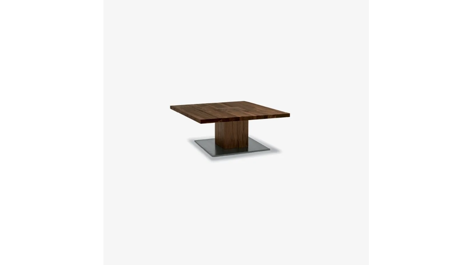 Tavolino Boss Executive Small realizzato interamente in legno massello con gamba a vista sul top ricavata da un blocco unico e piastra a pavimento in ferro di Riva1920