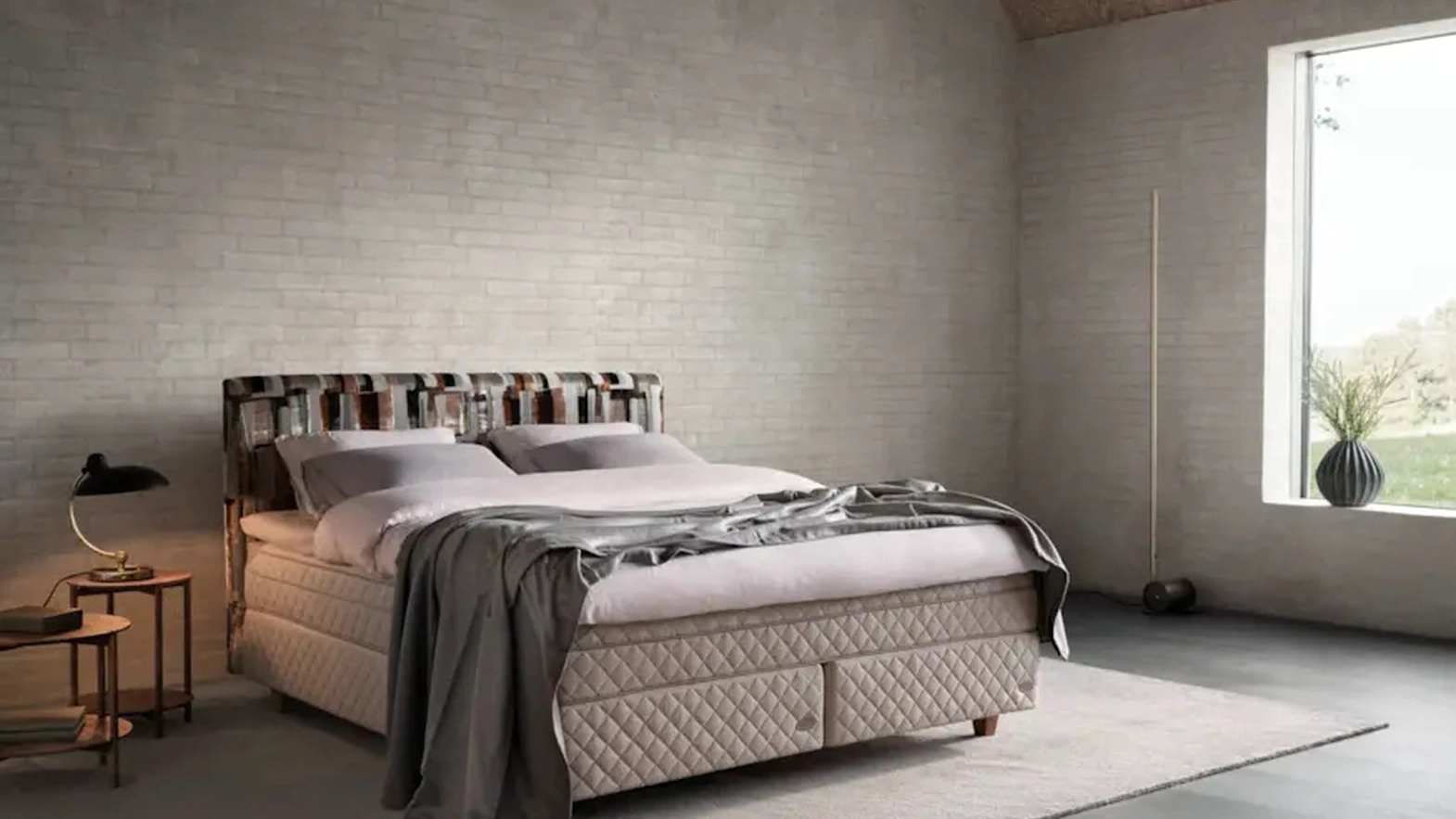 Letto con testiera Astoria di Duxiana