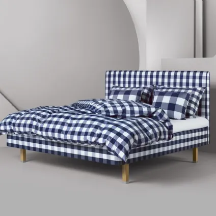 Letto Marquis in materiali naturali e con testiera in stile moderno di Hästens