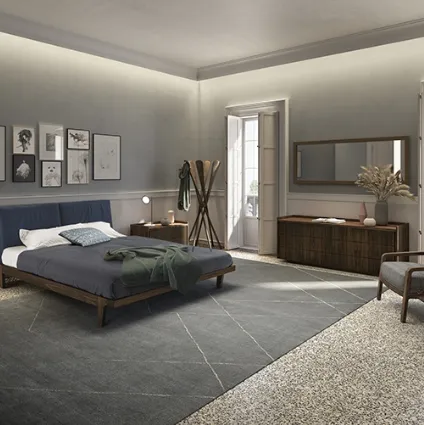 Letto con testiera Revo Soft Bed interamente realizzato in legno massello dove due cuscini in tessuto imbottito ne aumentano il comfort di Riva1920