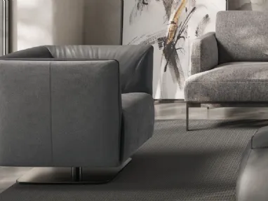 Poltroncina in tessuto e pelle Dodi di Natuzzi