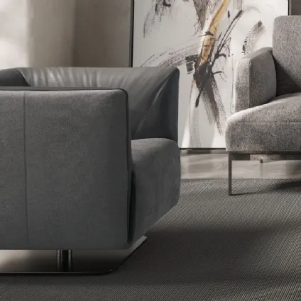 Poltroncina in tessuto e pelle Dodi di Natuzzi