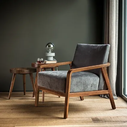 Poltrona Noblé Armchair in tessuto imbottito con struttura in legno massello di Riva1920