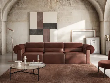 Divano lineare in pelle con inserti in tessuto New Classic di Natuzzi