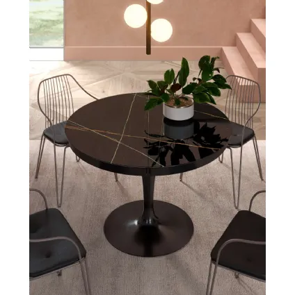 Tavolo rotondo allungabile Eclipse con top in marble glass Sahara Noir Lucido di Ozzio