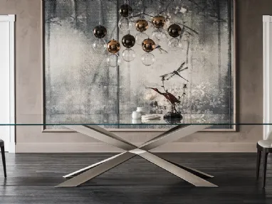 Tavolo con piano in cristallo e base in metallo Spyder di Cattelan Italia