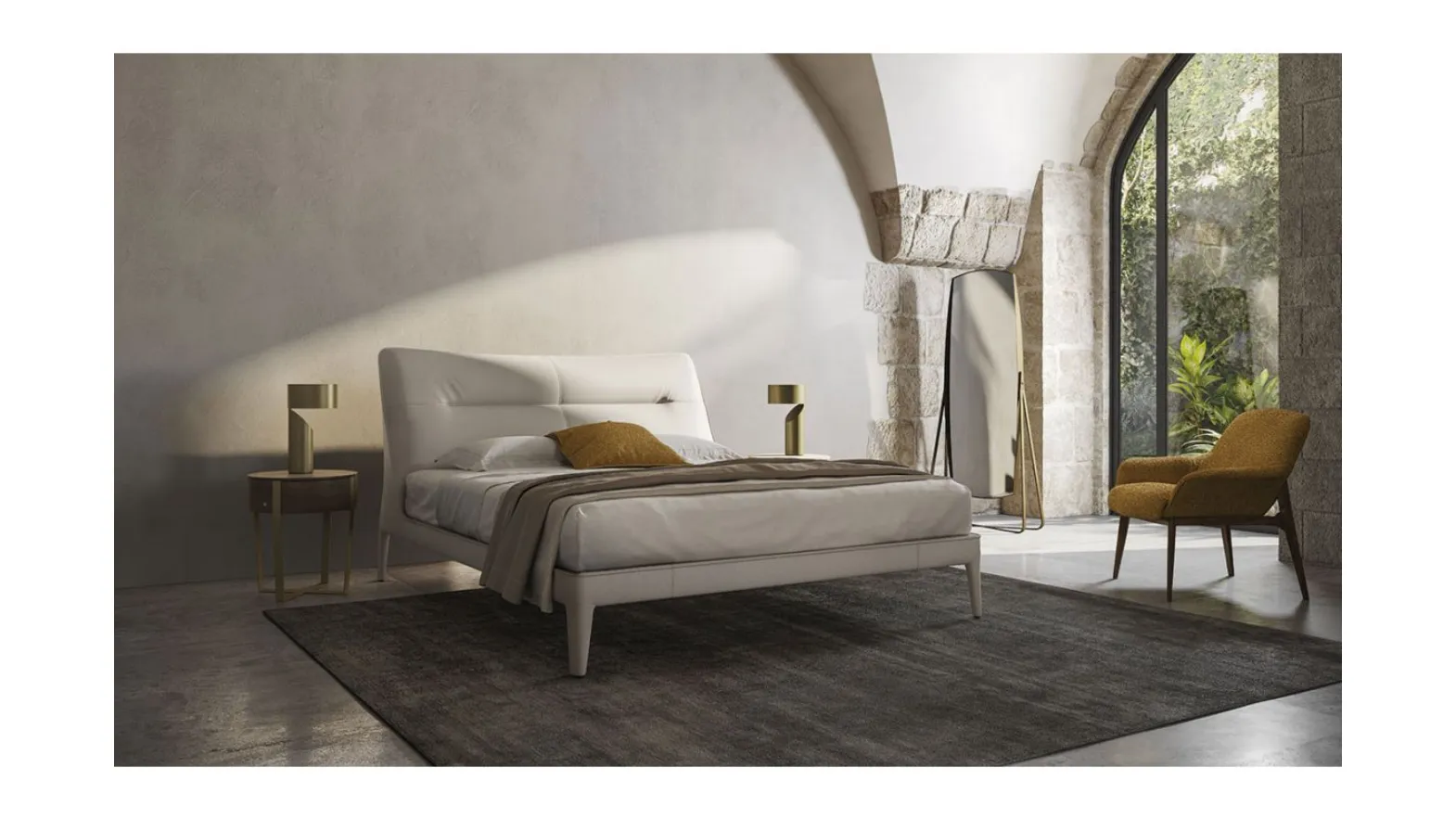 letto con testata imbottita Natuzzi